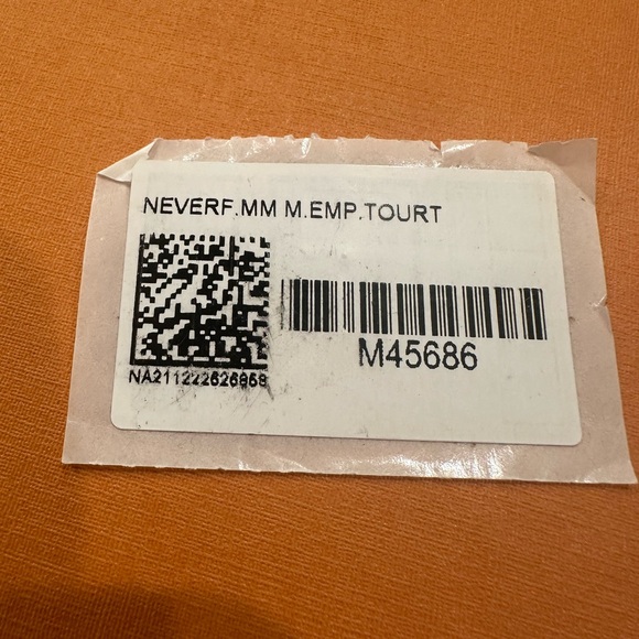 Louis Vuitton Neverfull MM Turtledove Monogram Empreinte with Pouchette. - Picture 15 of 15